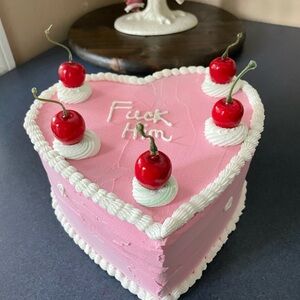 Fake decorative pink cake with cherries and hearts - F*** him